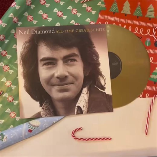 Make it a Neil Diamond Christmas this year with All-Time Greatest Hits, now on 1LP on metallic gold vinyl—available exclusively in the Neil Diamond Shop. Listen to “I Am…I Said,” “Sweet Caroline,” “Soolaimon,” and more 🤍 | Neil Diamond