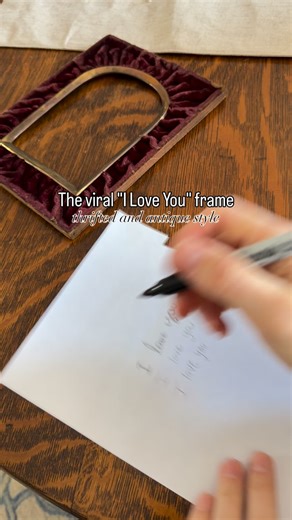 Turning the viral “I love you” frame into something way more me 🤍 I skipped the boring basic frame and used a thrifted antique frame instead — and I’m obsessed with how it gave this trend a vintage, heirloom feel. This was such an easy DIY home decor project and cost almost nothing. I just had each of my kids wire 4: I love you and I went over it with a Sharpie. Easy, peasy. Proof you don’t need expensive art — just a little creativity and a good thrift find. If you love thrift flips, vintage d