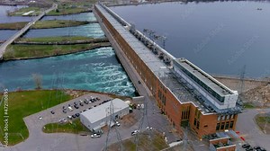 View of the Beauharnois Hydroelectric Generating Station along the Saint Lawrence Seaway on the Saint Lawrence River, in Quebec, Canada. High quality 4K aerial view.