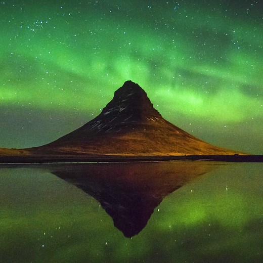 Kirkjufell, or 'Church Mountain', is a distinctly shaped peak found on the north shore of Iceland’s Snæfellsnes Peninsula 📍 It's often called ‘the most photographed mountain in Iceland’ due to its dramatic formation and perfect coastal location 📸🏔️ Learn more about Mount Kirkjufell here 👇 https://guidetoiceland.is/travel-iceland/drive/kirkjufell | Guide to Iceland