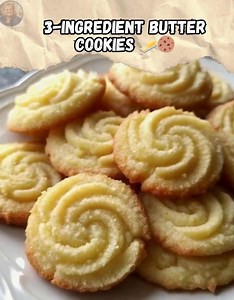 -Ingredient Butter Cookies 🧈🍪 These melt-in-your-mouth butter cookies are so simple yet so delightful! Just three pantry staples, and you’ve got a classic treat perfect for tea time, holidays, or anytime you need a little sweetness. 📝 Ingredients: 1 cup butter, softened and slightly melted 1 cup powdered sugar 2 cups all-purpose flour 👩‍🍳 Instructions: Preheat oven to 350°F (175°C) and line a baking sheet with parchment paper. In a mixing bowl, beat the softened butter until creamy and smoo