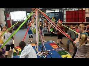 First learning how to weave May Pole