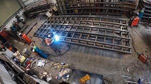 Fabricating large steel frame with precision welding