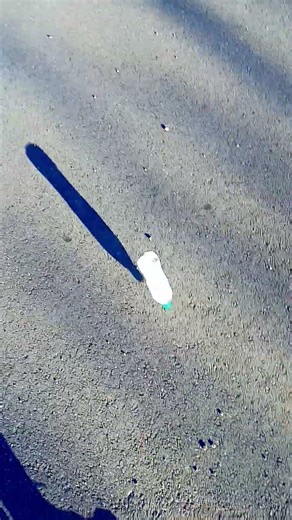 throwing full water bottle onto concrete sound effect