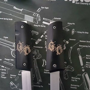 Some custom hand engraved 1911 grips, every fine detail is addressed. Nothing is overlooked, GunEngraver.com Custom Guns Knives and More. | Hand Crafted Art