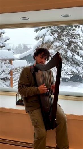 @marcojacomej serenading with his Harpsicle Harp in Alaska. Nice to look at the snow and still be warm. Lol. . #celtic #harp #harpist #strings #alaska | Harpsicle Harps