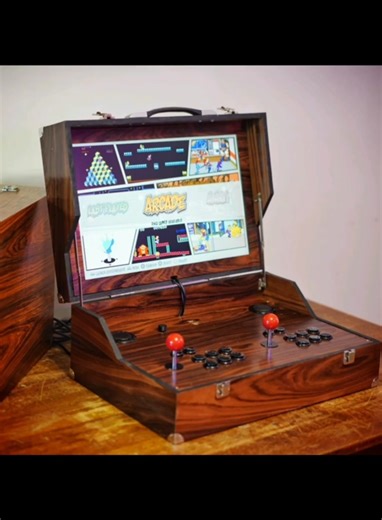 Built this briefcase styled arcade machine. 2 player setup. USB ports to plug in extra controllers if needed. #bespoke #custommade #retro #gaming #maker #arcademachine #retrocadesg #diy