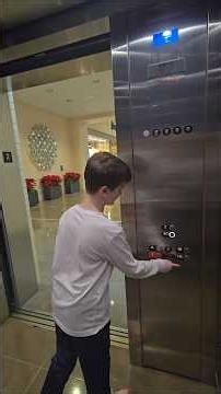 OTIS Gen 2 elevators and escalators outside Nieman Marcus in NorthPark Center mall - Dallas, Texas