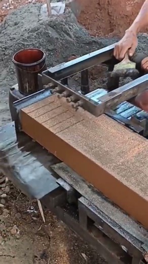 This is how bricks are made from red clay soil and sand, using a long iron wire as a cutter #viral