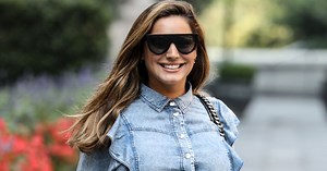 Kelly Brook flaunts toned legs in denim playsuit as she embraces heatwave