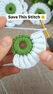 14K views · 59 reactions | Sometimes one stitch is enough to create a wow effect  This puff stitch flower is perfect for beginners learning texture, and just as satisfying for experienced crocheters who love detail. Soft, dimensional, and endlessly customizable ✨ Use it as an applique, bag accent, blanket detail, or decor piece. Want the full tutorial or written pattern? Comment below and I’ll share it with you. | Crochet Kingdom (E.H) | Facebook