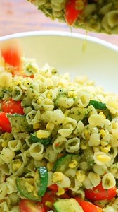 Basil Pasta Salad with tomatoes, zucchini and corn! https://themeddish.com/Basil-Pasta-Salad | The Mediterranean Dish