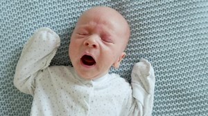 portrait of a crying screaming baby