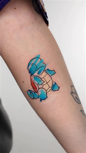 MOMMY I‘M SORRY on Instagram: "ONE OF US With a calm yet playful spirit, @gil_miguel_tattoo_ turns anime and cartoon icons into living art. From Pokémon to One Piece, his brush-like style feels alive, joyful, and unmistakably his."