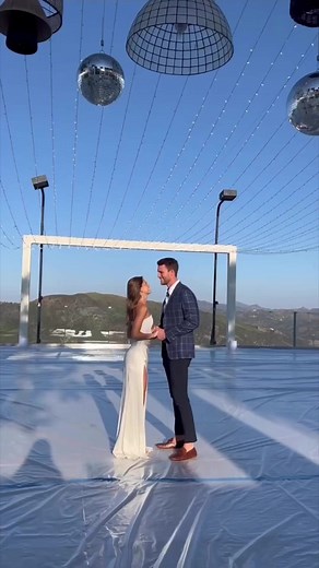 Bride Samantha Brooks is breathtaking in her Blue Willlow by Anne Barge wedding gown. Her stretch crepe column gown features an elegant off-the-shoulder drape and diagonal draping at the hip, creating a breathtaking look for her romantic Malibu wedding. Gown: "Catalina" from the Blue Willow Collection by Anne Barge Bridal Store: Kinsley James Couture Bride: Samantha Brooks Groom: Corey Brooks #annebargebride #weddinggown #bridetobe #couturebride #losangeleswedding #bayreawedding #kinsleyjames | 