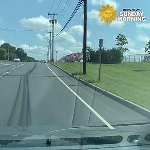 Students planted nearly 300 American flags in front of Kings Park High School in Suffolk County, New York, in commemoration of the 20th anniversary of the September 11 attacks. | CBS Sunday Morning