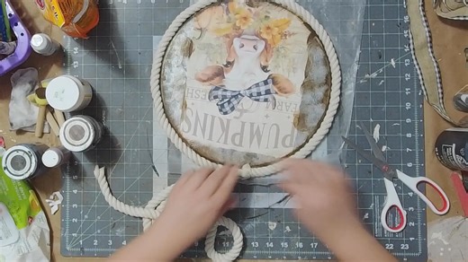 Farmhouse Cow hanger using a pizza pan from Dollar Tree | Burlap Kitchen