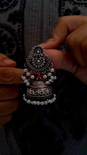 CreativeZeal by Sapna Wadhwani on Instagram: "✨ Grace that never goes out of style ✨ Our silver oxidised antique pearl layered jhumka earrings are a perfect blend of vintage charm and timeless elegance. Designed to add a royal touch to every look, these beauties are now available and ready to shine with you. 💌 DM us to place your order and make them yours. #SilverJhumkas #OxidisedJewellery #AntiqueJewellery #PearlJhumkas #LayeredJhumkas EthnicElegance TraditionalVibes IndianJewellery Handcrafte