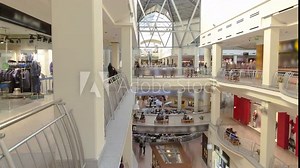 Many shops in multi-level department store or shoping mall timelapse hyperlapse. Aerial view from above