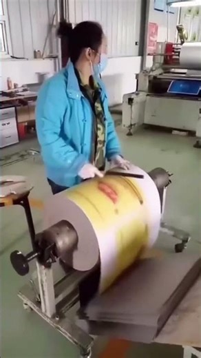 Cutting process of laminated packaging paper in roll