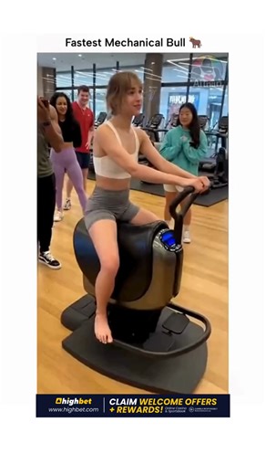 Warm Vibes ✨ on Instagram: "This video is the absolute definition of "that escalated quickly." It starts off innocently enough in what looks like a gym or an arcade, with a girl barefoot and ready to try out a mechanical horse-riding fitness machine. She looks calm, smiling at her friends standing behind her, and casually says, "Okay, here we go," expecting a standard core workout. But the machine clearly had other plans. In the span of a single second, it bypasses "trot" and "canter" and goes s