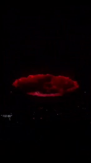 Exciting Concert Scene with Captivating Light Show