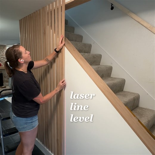 Opening up our dark stairway wall to let in more light with these wooden slats! | Maker Gray