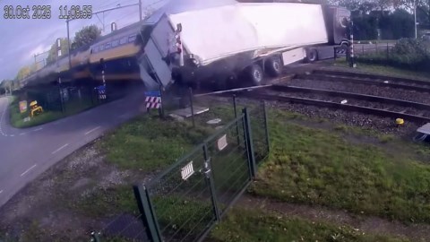 Dutch train smashes through fruit truck sending produce flying
