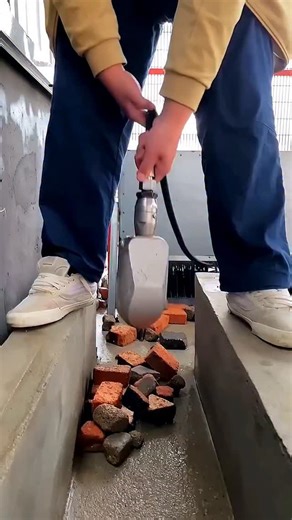 Real Engineerings | Engineering & Technology & Gadgets & DIY on Instagram: "Zero Contact Cleaning: The Power of the High-Pressure Water Jet! 💨 ​This is industrial cleaning at its most satisfying! Watch this specialized nozzle, often used for clearing sewage lines or storm drains, demonstrate its remarkable power in a debris-filled trench. ​The Clever Mechanism: ​The Tool: The worker drops a torpedo-shaped metal nozzle (which may be self-propelling or manually guided) into the drain. This nozzle