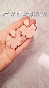 I love using Cernit Opaline clay for simpler dangle designs. It's halfway between opaque and translucent clay, so it's just really pretty and soft. It almost looks like translucent ceramic. ☺️ #springcrafts #polymerclaycutters #earringmaking | The Clay Impress