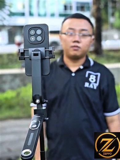 Zeppo Face Tracking Tripod. NO NEED FOR CAMERAMAN. Best for tiktokers(if you want to go live), YouTubers , bloggers and content creators. Follows your face wherever you turn. Use as selfie stick also. • 🤖 AI Face Tracking: Automatically keeps you centered in the frame — no help needed. 🦵🦵🦵🦵 Quad-Leg Stability: Sturdy support on any surface — no wobbling or shake. • 📱 Bluetooth Remote Control: Snap photos and start/stop recording from a distance. • 🎥 Hands-Free Shooting: Perfect for vlogs,