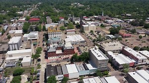Vicksburg, Mississippi, USA - April 23, 2024: Afternoon sun shines on the historic buildings of downtown Vicksburg.