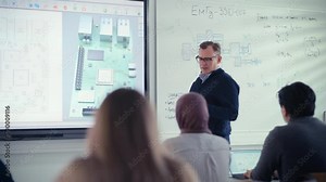 Male Educator Use projection screen and Explain to Diverse Students About Computer Motherboard Components while Point at it. Education, Computer Science and High Tech Concept. Slow Motion