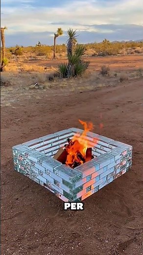 He builds a brazier with glass bricks… and lights a real fire.
