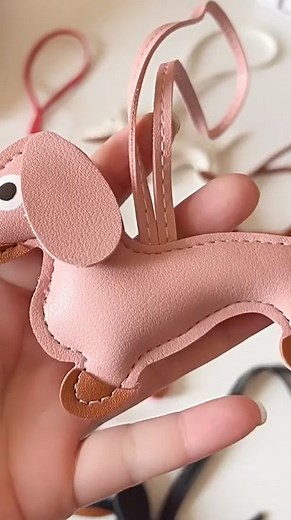 Expertly handcrafted with love and care, this adorable leather puppy bag pendant is the perfect accessory for any dog lover. | Just Leather Things Club | Facebook