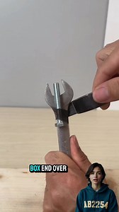 Remove a stuck bolt with a wrench and hammer by placing the wrench's box end over the bolt head. #StuckBoltRemoval #WrenchHammerHack #ImpactRemoval #DIYMechanic #ShockTreatment #diy #diyprojects | Ab2254