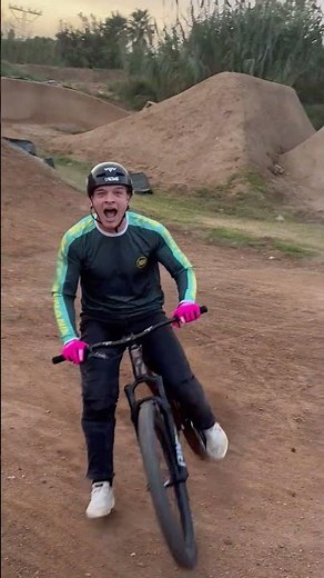 Epic BMX Tricks on a Dirt Track at Sunset