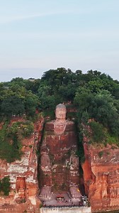 Nestled within lush mountains and ancient temples, the Leshan Giant Buddha Scenic Area in southwest China's Sichuan Province is home to the world's largest stone Buddha. Carved into a cliffside over 1,300 years ago, this 71-meter-tall Buddha peacefully watches over the confluence of three rivers. The surrounding area is rich with ancient pagodas, tranquil temples, and hidden grottoes, making it not only a historic site but also a haven for explorers and nature lovers alike. Deputy director of th