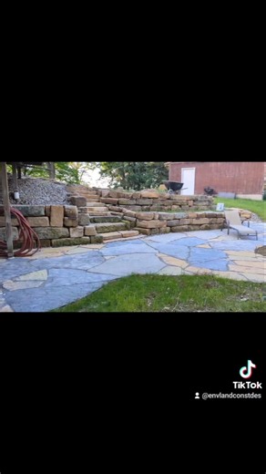 Stone patio, walkways, retaining walls, & stone fire pit. #stonefirepit #retainingwall #patiodesign