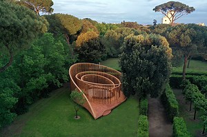 spiral wooden pavilion invites visitors to a sensory and playful experience