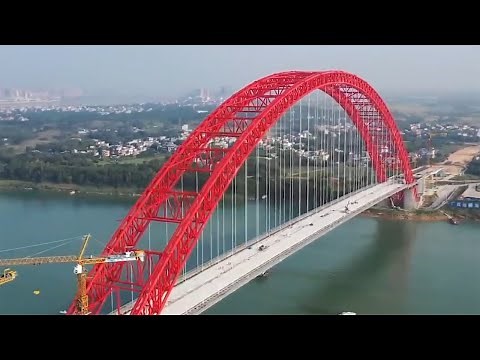 Construction of the largest and longest arch bridge in the world here one place. Pingnan, China