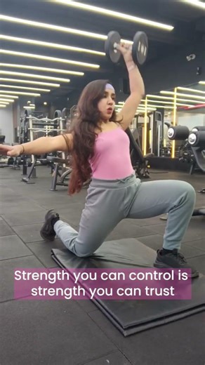 Half-kneeling single-arm DB press — #shoulder strength, #core control and overhead #mechanics.