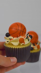 Are you watching March Madness?! How fun are these basketball themed cupcakes? Topped with our Slam Dunk Sprinkles and Basketball Cupcake Toppers, these cupcakes are just perfect for a basketball party! #ShopSweetsandTreats #BakeBright #BakeBeautifully #sprinklemix #sprinkles #basketballparty #basketballcupcakes #marchmadnessparty #marchmadenesscupcakes SLAM DUNK SPRINKLES MIX: https://www.shopsweetsandtreats.com/sprinkles-mix-slam-dunk | Sweets & Treats Boutique