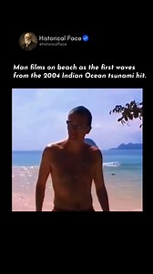 The footage filmed on a beach captures one of the earliest visual records of the 2004 Indian Ocean tsunami, recorded shortly after a powerful undersea earthquake struck off the coast of Sumatra. At first, the scene does not appear immediately catastrophic. The shoreline looks calm, though the ocean begins to behave in unusual ways, with the water withdrawing from the beach and then returning in fast, uneven surges. These early movements were not the largest tsunami waves, which made the danger d