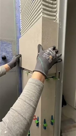 Installation of ceramic tiles on door frame wall surface #shorts