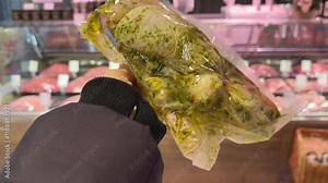 choosing pork, beef and other meats at the grocery store