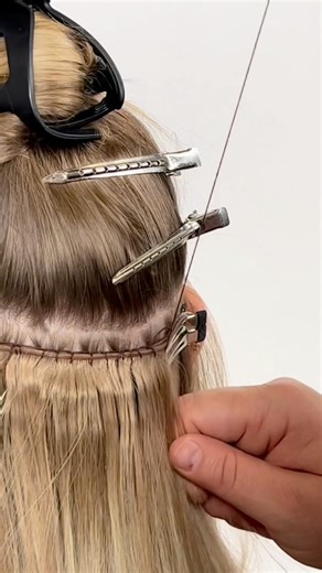 Donna Bella Hair Extensions on Instagram: "Install of one of our most popular methods— Hybrid Wefts. Love for their seamless blend, full movement, and ultimate customization. 22” Hybrid Weft Balayage #12/80 and Rooted #12/60"