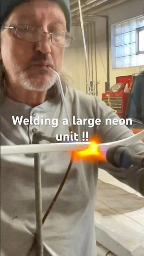 This large piece of neon glass is for a Texaco Sign .