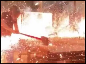 Smashing A Heated Ball With Hammer