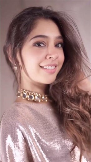 Niti Taylor stuns in her latest photoshoot and video shoot donning a shimmering silver western dress
